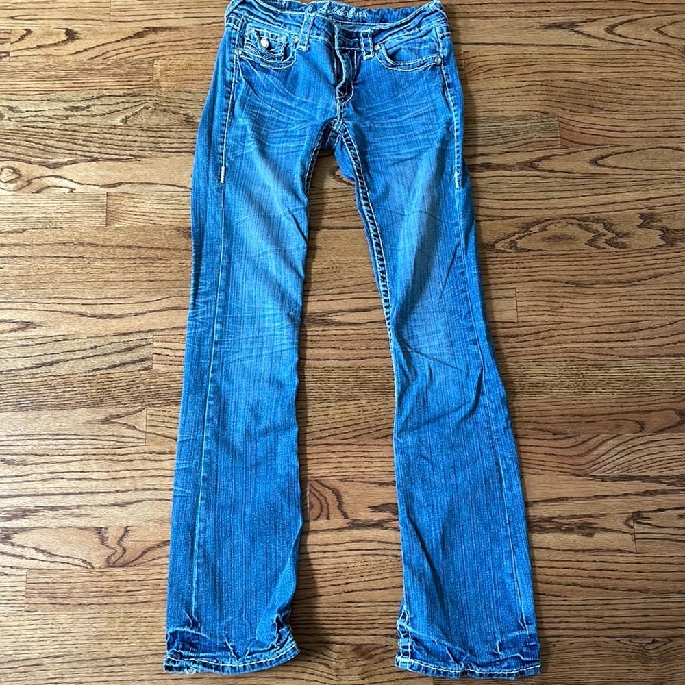 Light wash boot cut jeans